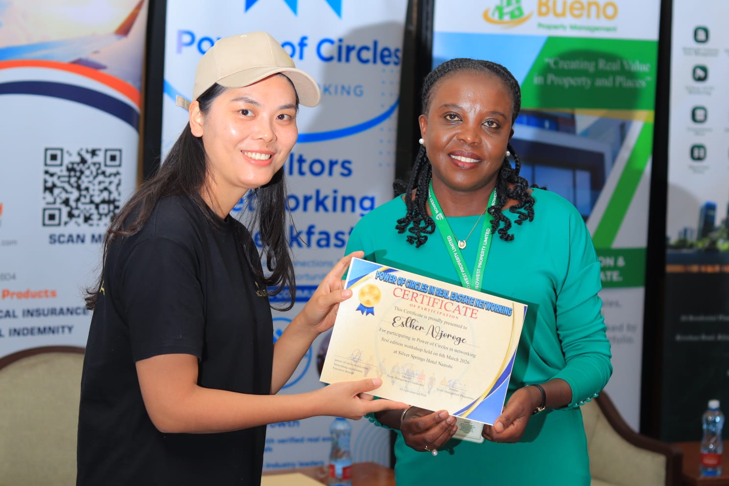 A participant receiving a networking workshop certificate
