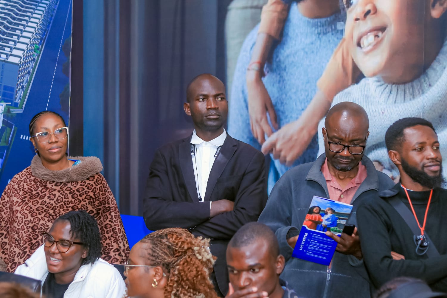 Attendees listening during a real estate session