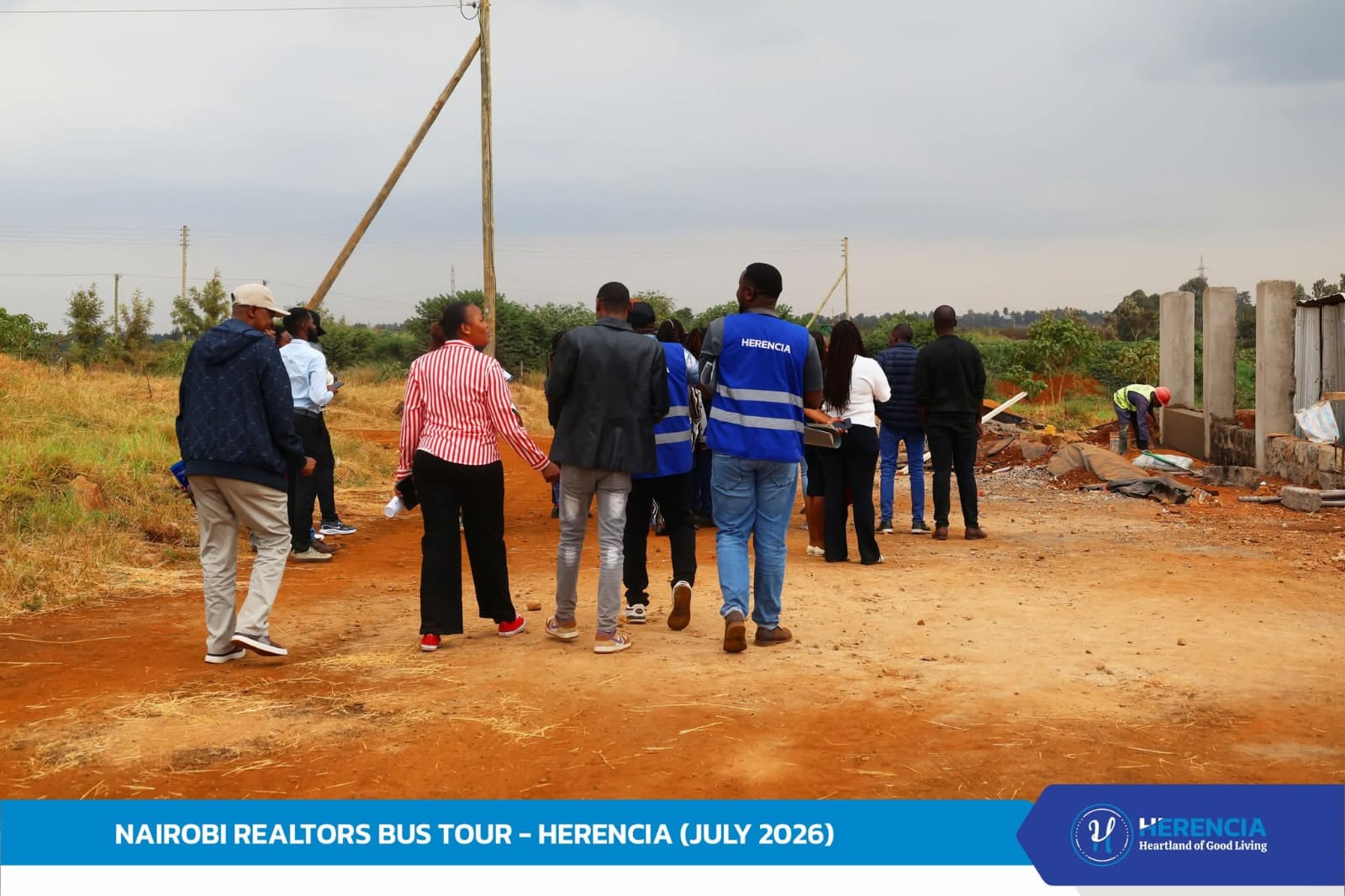Delegates walking a project site on the Nairobi Region bus tour